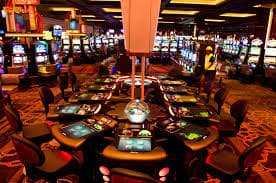 Queen King PH App mobile device dashboard showcasing sportsbook and casino games